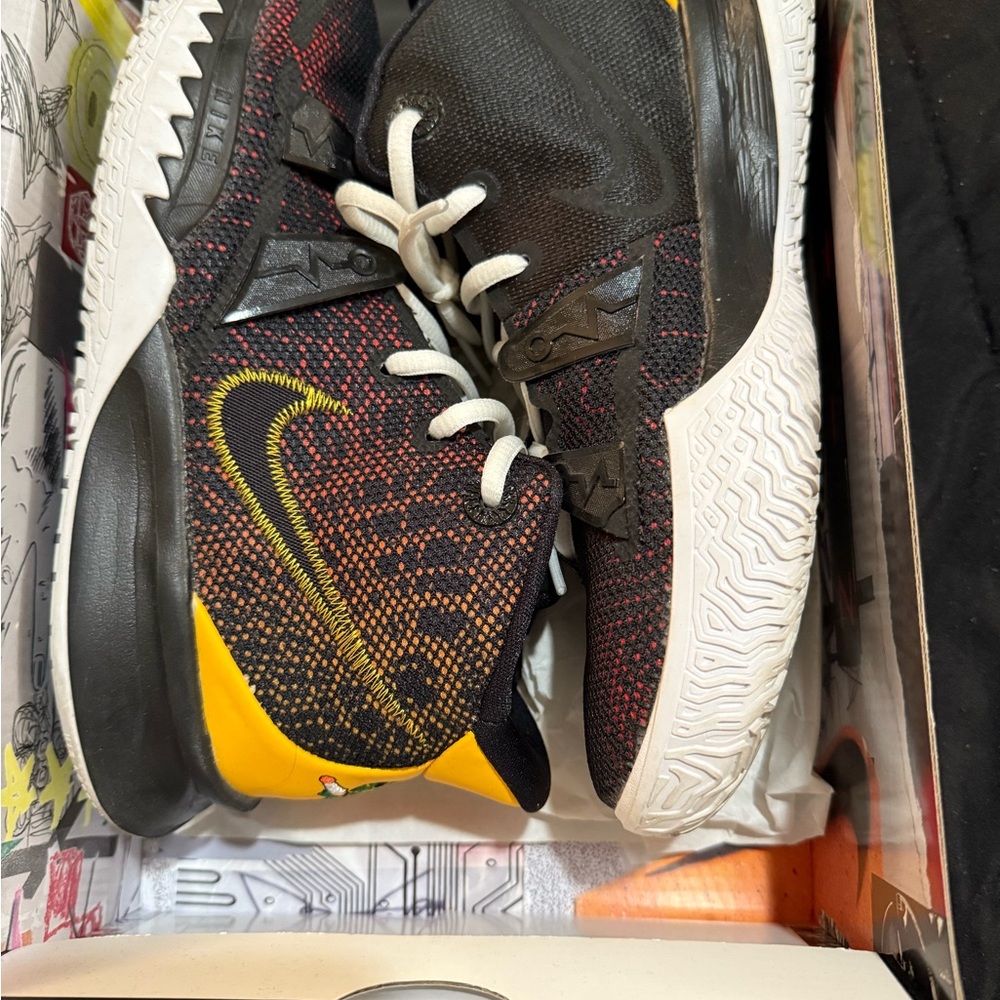 Nike Kyrie 7 Black and Gold Sneakers